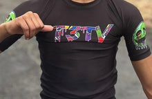 Load image into Gallery viewer, T3TV BLACK COMPRESSION SHIRT/ GREEN LOGO
